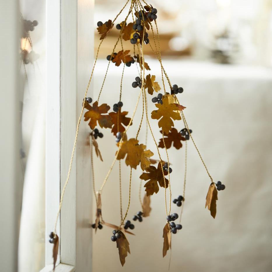 BRASS LEAF AND WOODEN BEAD HANGING DECORATION