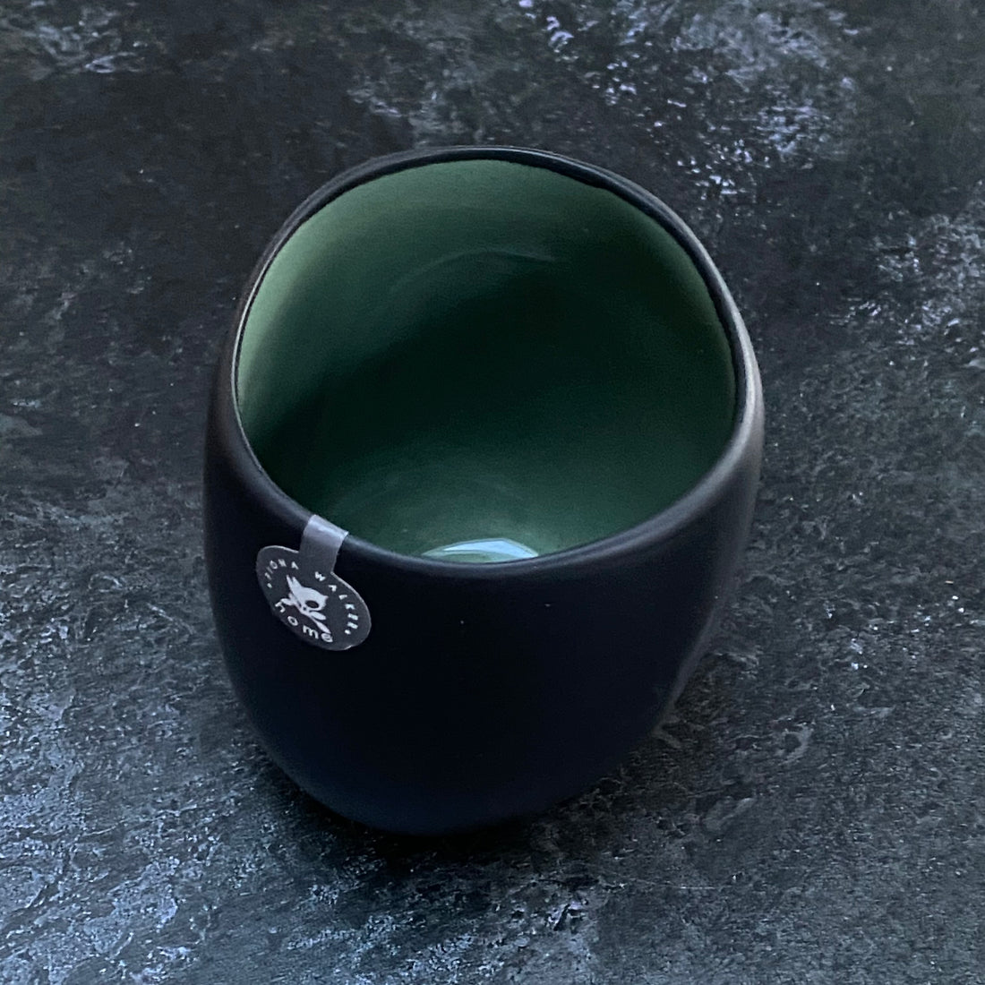 BLACK STONEWARE TEALIGHT WITH GREEN GLAZE INSIDE